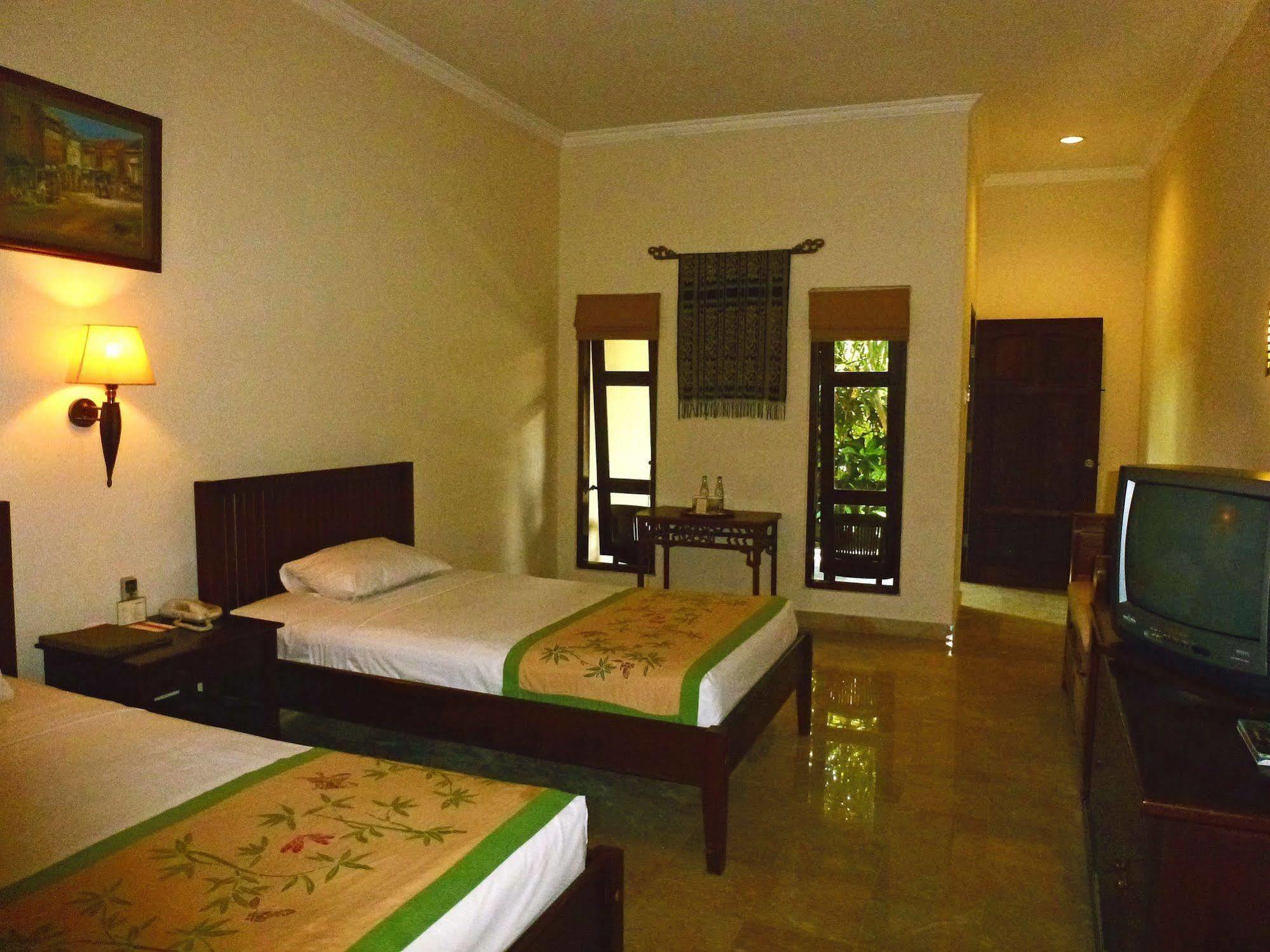 Hotel Puri Bambu Джимбаран Экстерьер фото