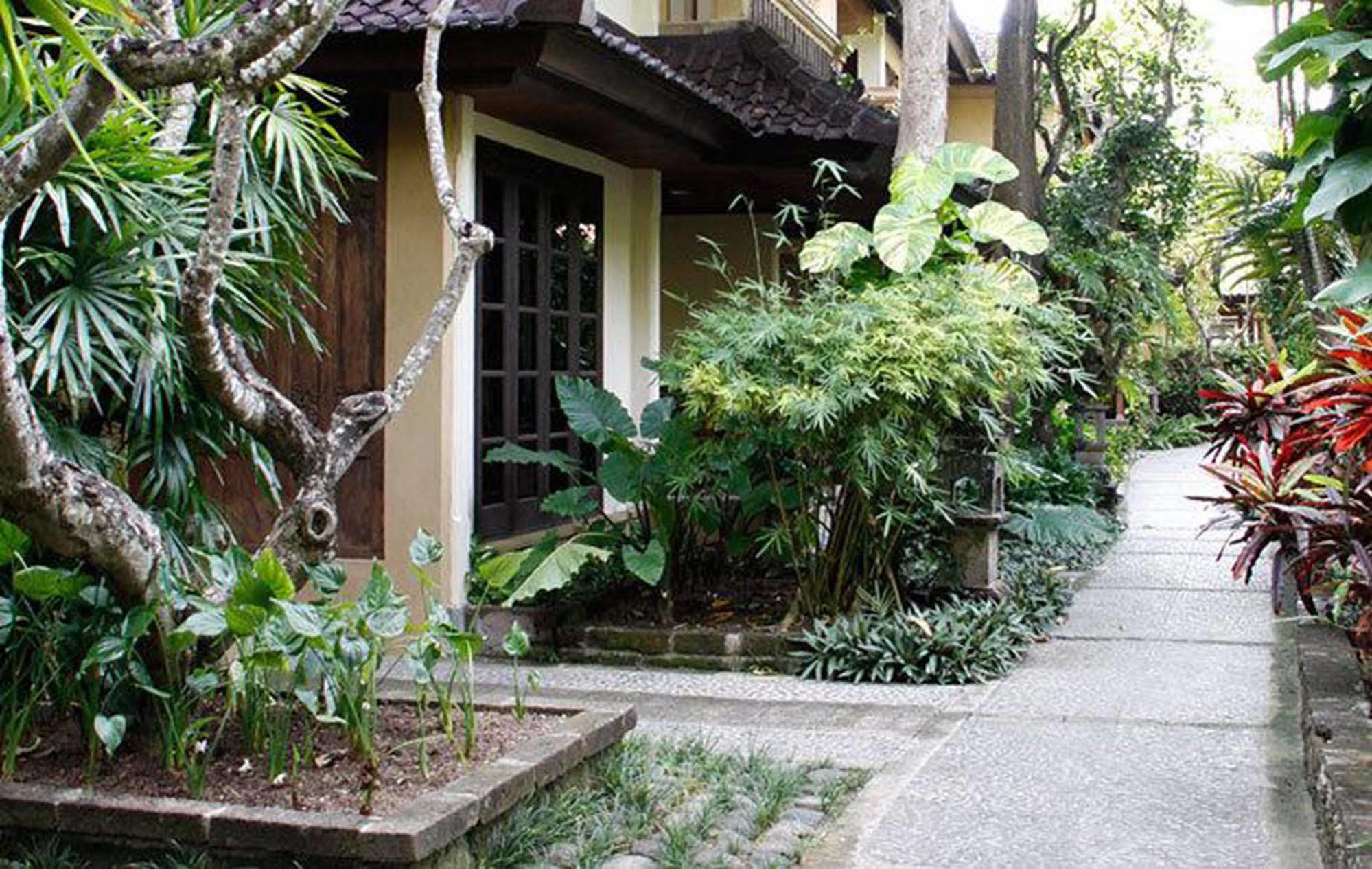 Hotel Puri Bambu Джимбаран Экстерьер фото